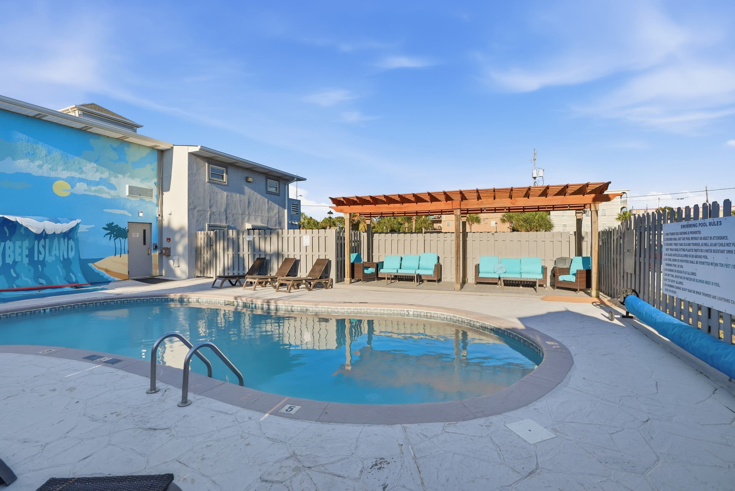 The heated saltwater pool and pergola at Admiral's Inn